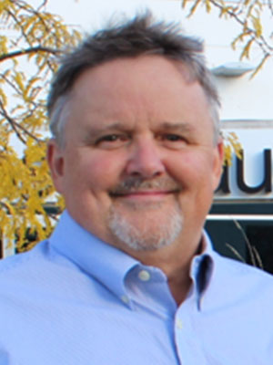 Portrait of Dean Rudd